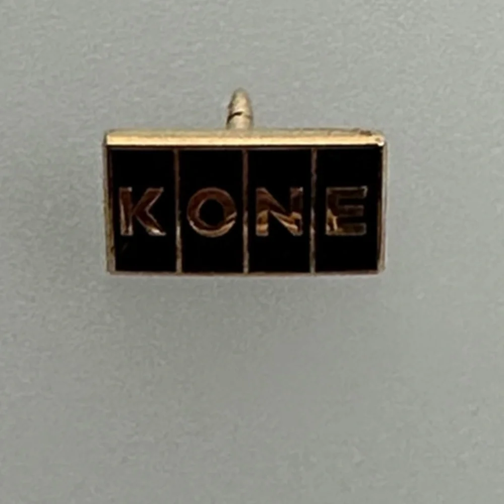 10k Gold KONE  Black and Gold Pin
